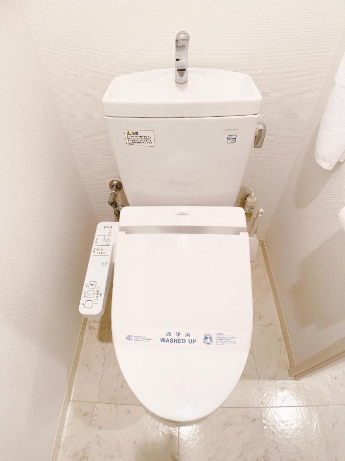 Ouchi Hotel Takeya Hiroshima Bagian luar foto